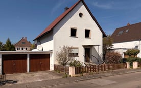 1,5 ZKB im 2-Familienhaus – Dachterrasse, großzügiger Garten, Garage & Stellplatz
